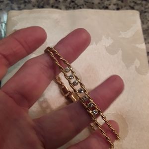 3/$10 Goldtone and faux diamond mesh rope braclet stamped "m"